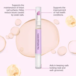 Detail view of the dual-ended cuticle oil pusher pen designed for nail care and moisturization.