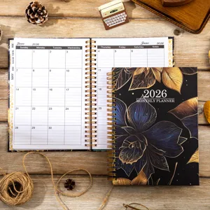 2026 monthly planner notebook with floral cover, spiral bound daily organizer and work schedule.