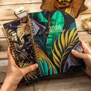 Detailed view of the 2026 floral monthly planner notebook with spiral binding for daily work.