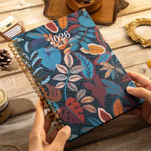 2026 monthly planner notebook with vibrant floral leaf cover design spiral bound office planner