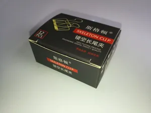 Detail view of metal skeleton binder clips packaging box, 12 pieces office stationery set.
