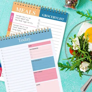 English daily weekly planner spiral notebook with meal and to-do lists for time management.