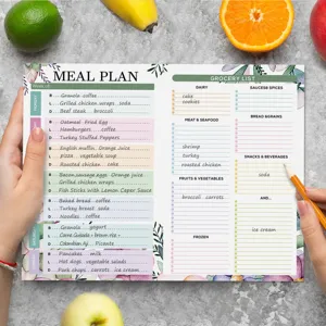 Weekly meal planner notepad with magnetic back for kitchen fridge and daily food tracking.