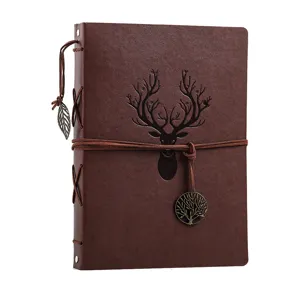 Vintage brown leather scrapbook photo album with deer embossing and rustic charm main