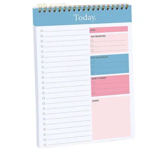Minimalist daily planner notebook with spiral binding and time management todo list pages.