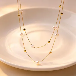 Elegant double layer pearl necklace with gold beads, titanium steel clavicle chain jewelry.