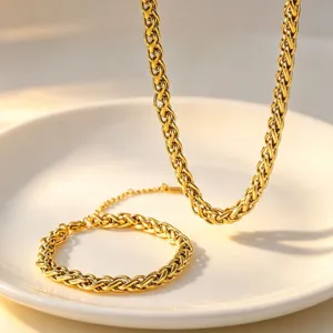 Gold plated stainless steel braided chain necklace and bracelet set for modern fashion jewelry