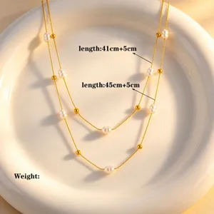 Exquisite double-layer baroque pearl necklace detail shot, elegant gold chain and pearl design.