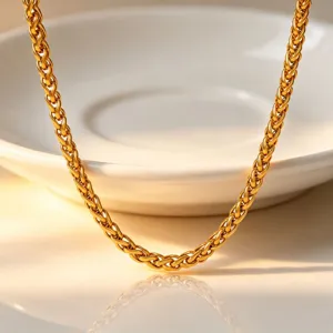Gold stainless steel woven chain necklace, elegant and fashionable jewelry for women.