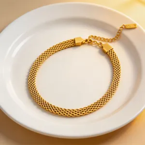 Gold titanium steel mesh chain detail shot, elegant woven snake bone necklace texture.