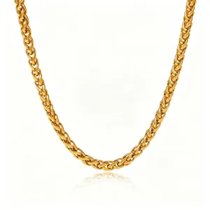 Detailed closeup view of the 18K gold plated stainless steel braided chain necklace detail view.