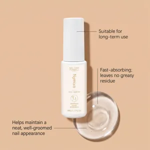Nymixa nail care serum detail showcasing nourishing formula and transparent texture.