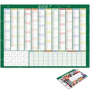 2027 wall calendar detail view showing monthly planning grid and colorful stickers.