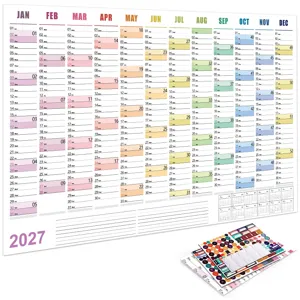 Detailed view of the 2027 wall calendar layout featuring monthly grids and planner stickers.