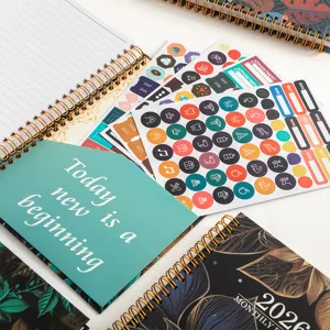 2026 planner notebook set with floral design, monthly calendar, and stickers for daily planning.