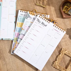 Detail view of aesthetic A5 weekly meal planner and schedule notepad with tearable sheets.