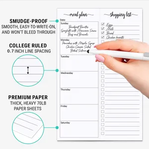 Detail view of daily meal planner notepad showing smudge-proof paper and college ruled lines.