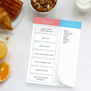 Minimalist meal planner notepad for daily grocery list and weekly food menu organization.
