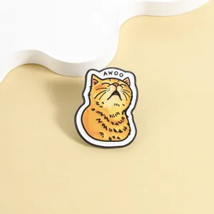 Cute quirky orange cat enamel brooch pin, funny animal badge for bags and clothes decor.