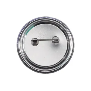 Metal badge pin back detail, secure metal clasp fastener for backpack and clothing decor.