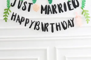 Detailed view of the forest style non-woven birthday letter banner party decoration.