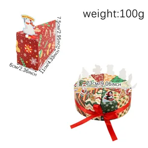 Detailweergave van de kersttaart cadeaubox met afmetingen en een gewicht van 100 gram.