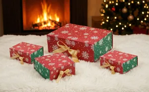 Christmas gift box set featuring red and green snowflake patterns with elegant gold ribbons.