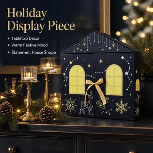 Boîte calendrier de l'avent maison de Noël avec cerf et flocon pour décoration de table.