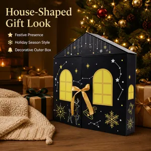 Boite cadeau calendrier de l'Avent en forme de maison avec design de cerf et de flocons de neige.