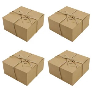 Quadratische Kraftpapier Geschenkschachteln mit Kordel und Dankeschön Anhänger für Kuchen.
