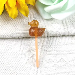 Resin cartoon duck lollipop pendant charm, cute DIY jewelry accessory for handmade crafts.