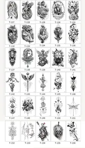 Waterproof temporary tattoo sticker sheet with various gothic, animal and tribal art designs.