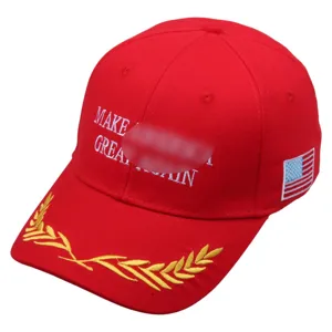Red cotton baseball cap with embroidered text and American flag patch, classic style.