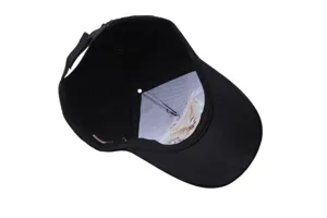 Detailed view of black baseball cap inner embroidery and lining design for outdoor sun protection.