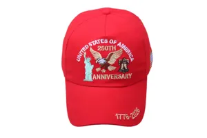 Detailed view of the red commemorative baseball cap with intricate embroidery and patriotic theme.