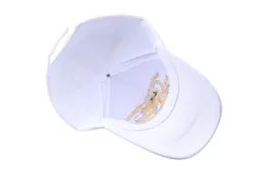 Detailed inside view of a white commemorative baseball cap with eagle embroidery.
