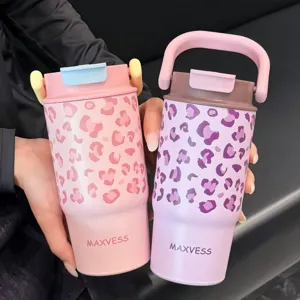 Detail of leopard print stainless steel vacuum insulated tumblers with carry handles