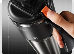 1000ml stainless steel vacuum insulated tumbler with convenient handle for outdoor travel.
