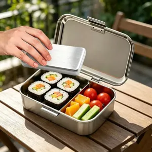Stainless steel bento lunch box with compartments, durable portable food container for office school.
