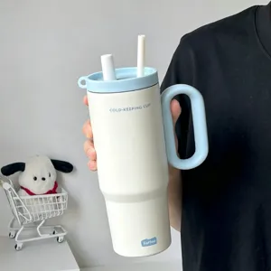 Stainless steel insulated tumbler with handle and straw, large capacity thermal travel mug.