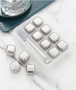 Reusable stainless steel ice cubes set with storage box and tongs for whiskey drinks.