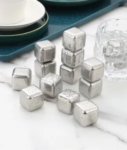 Stainless steel reusable ice cubes set for whiskey, drinks and beer cooling. Durable metal stones.