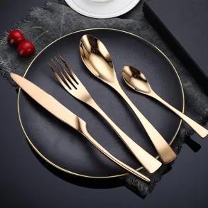 Luxury gold stainless steel flatware set, 4-piece knife fork spoon set for elegant dining.