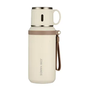 Bouteille isotherme minimaliste de grande capacité avec sangle, thermos de voyage en inox.