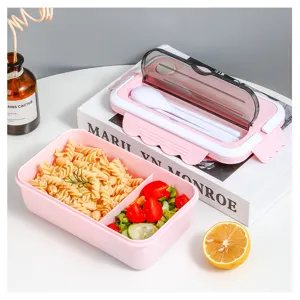 Pink divided plastic lunch box with utensils, cute bento box for office and school daily meals.