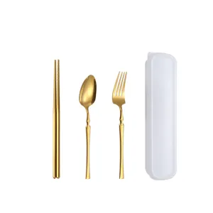 Tragbares Besteckset aus Edelstahl mit Stäbchen Löffel Gabel in edlem Gold Design.