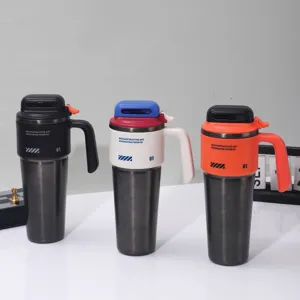 Detail view of large capacity insulated tumbler cups with straw and handle design features.