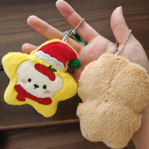 Peluche estrella de Navidad dibujos animados llavero detalle con costura trasera y textura.