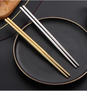 Edelstahl Stäbchen Set, runde Metallstäbchen in Gold und Silber, hochwertiges Besteck.