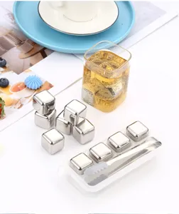 Stainless steel whiskey ice cubes set with storage box and tongs for cooling drinks.